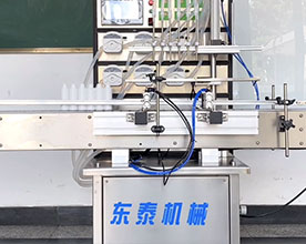 6頭液體灌裝機(jī)+四輪搓蓋機(jī)